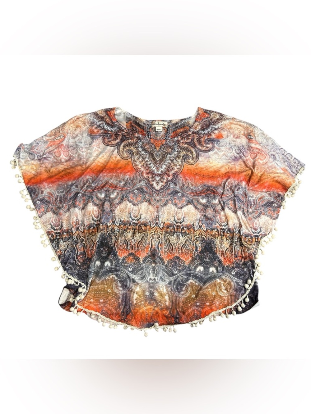 Orange and white paisley print poncho with pom poms and rhinestones.
Size large